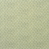 Fabric sample of a green and neutral printed linen fabric with a geometric pattern