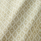 Fabric sample of a yellow and neutral printed linen fabric with a geometric pattern