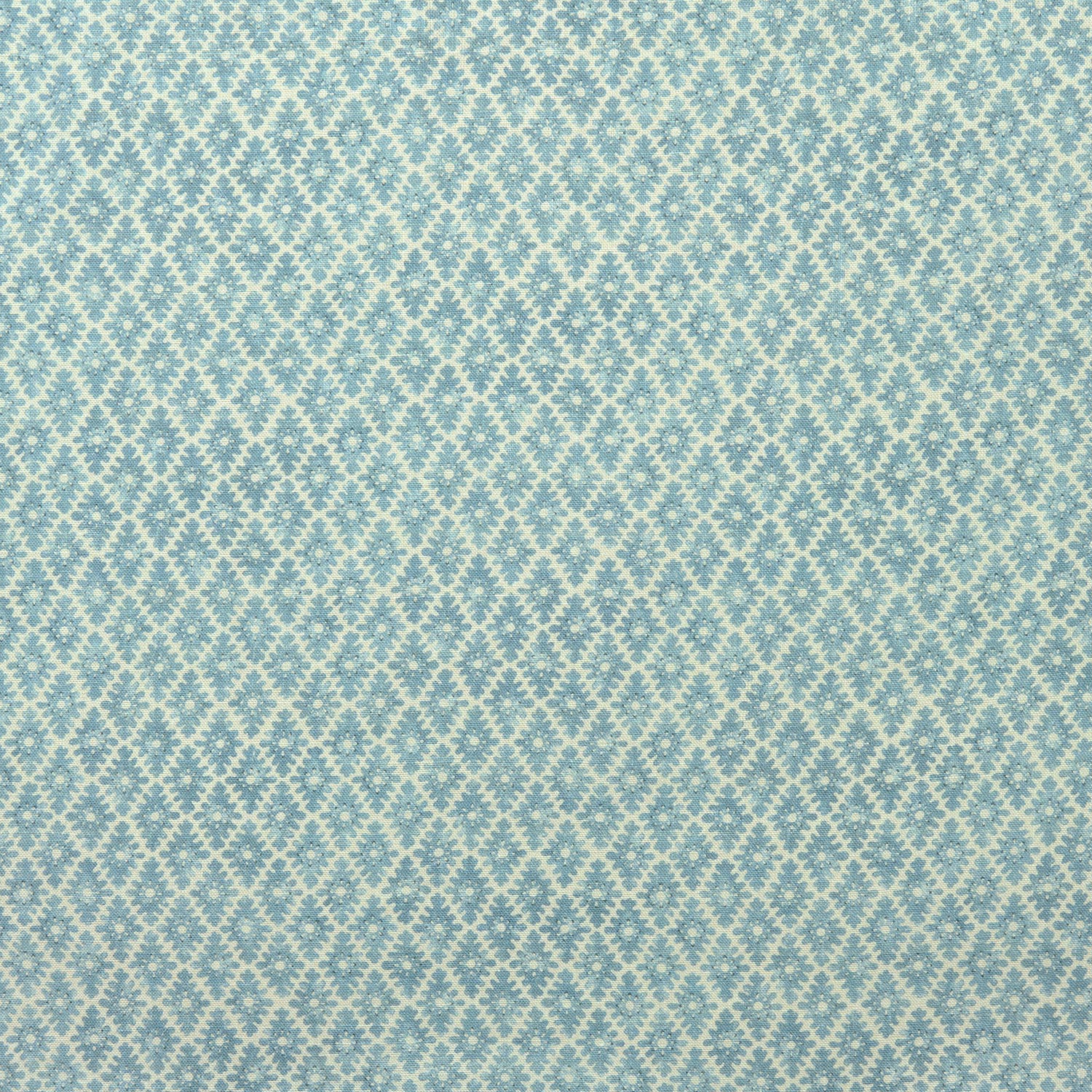 Fabric sample of blue and neutral printed linen fabric with a geometric pattern