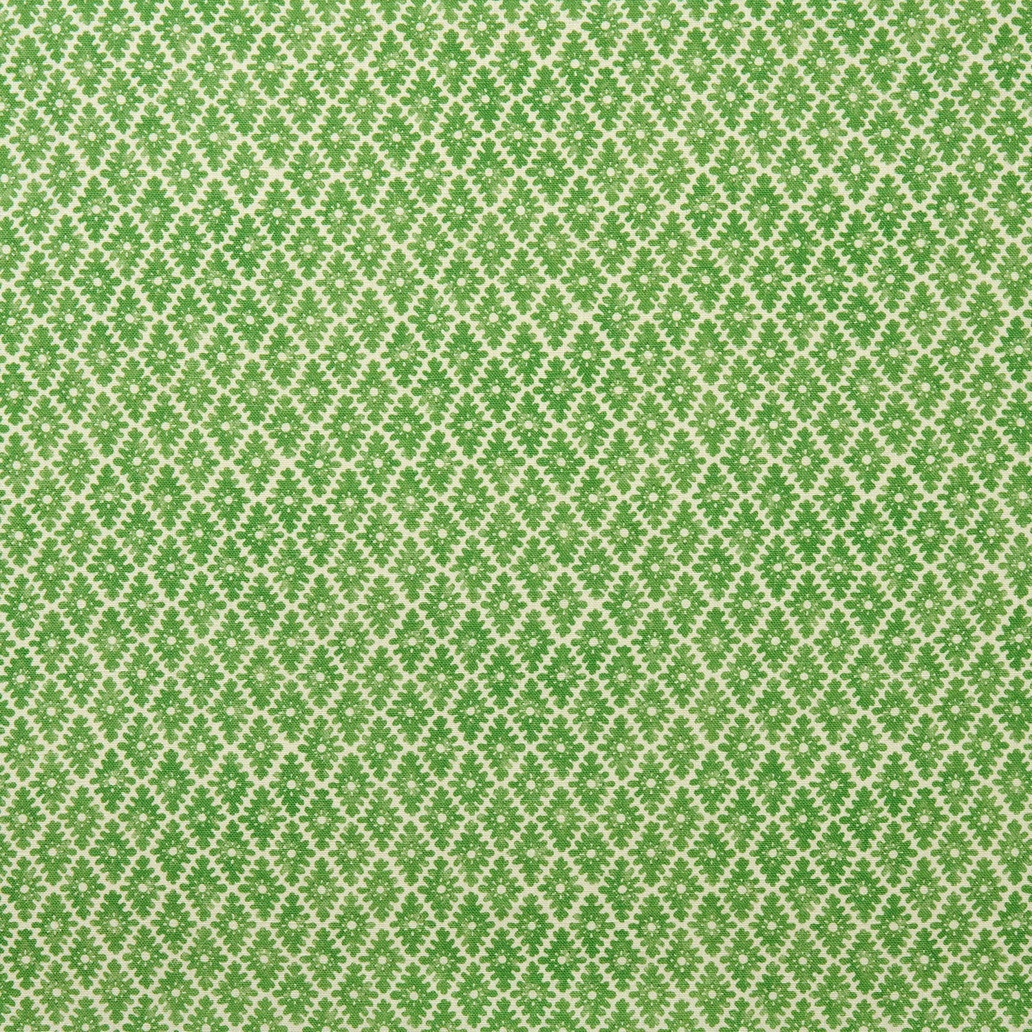 Fabric sample of a green and neutral printed linen fabric with a geometric pattern