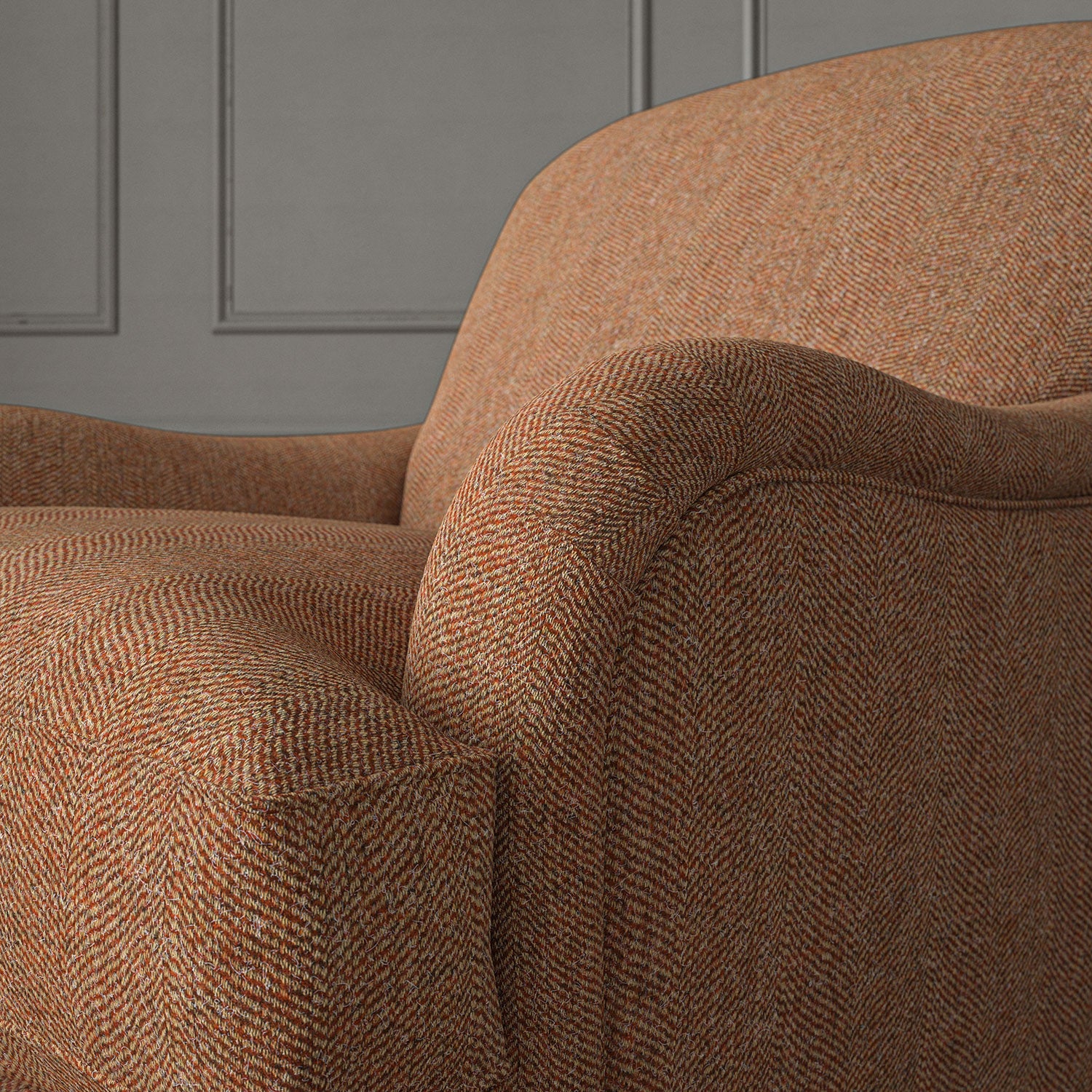 Orange chair upholstered in a herringbone pure wool woven fabric.