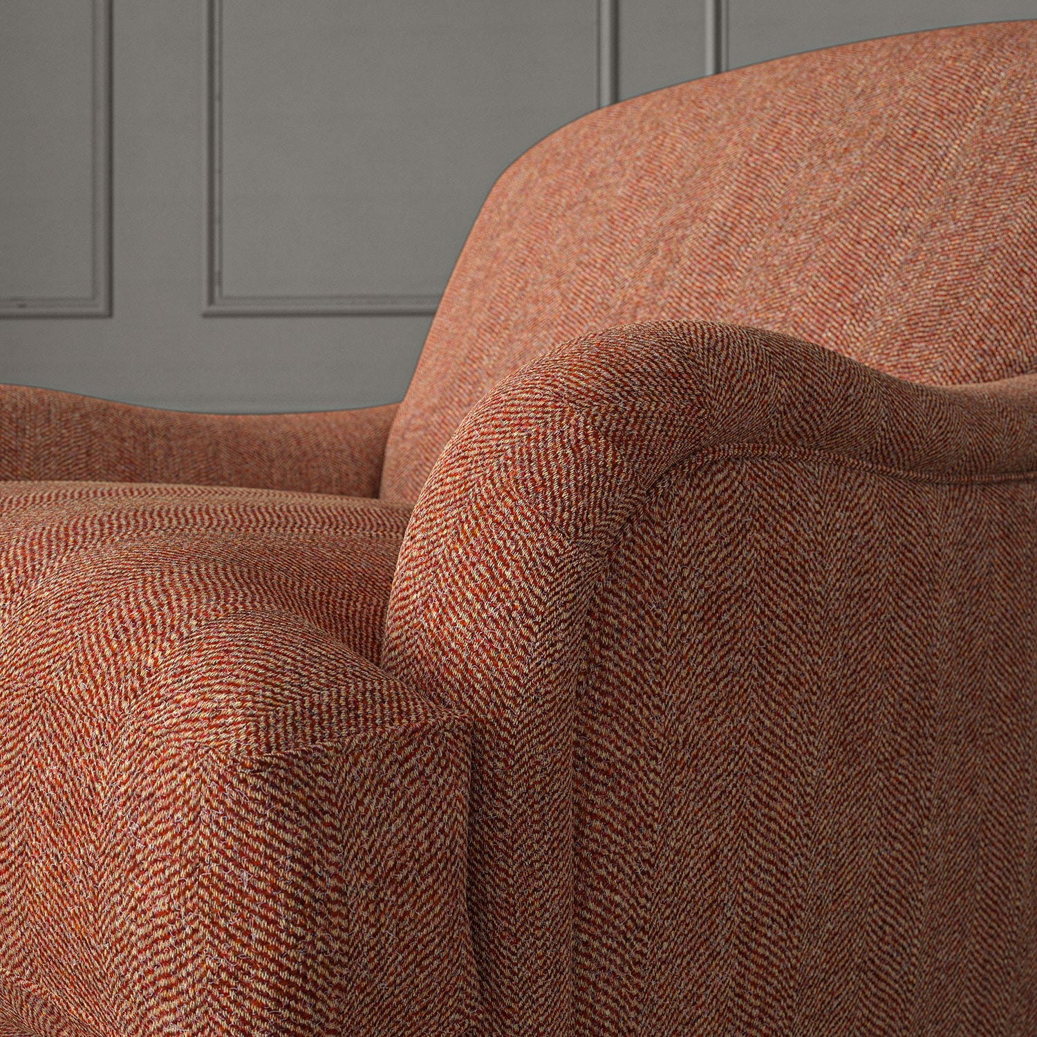 Red chair upholstered in a herringbone pure wool woven fabric.