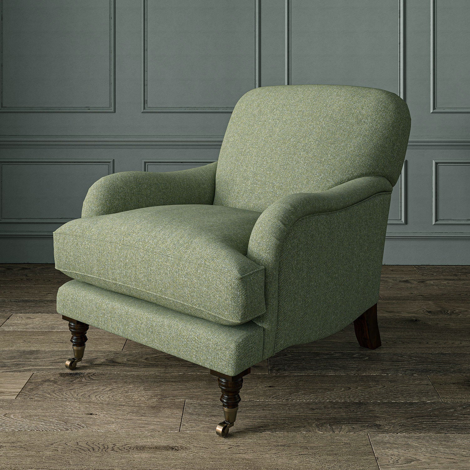 Green chair upholstered in a herringbone pure wool woven fabric.