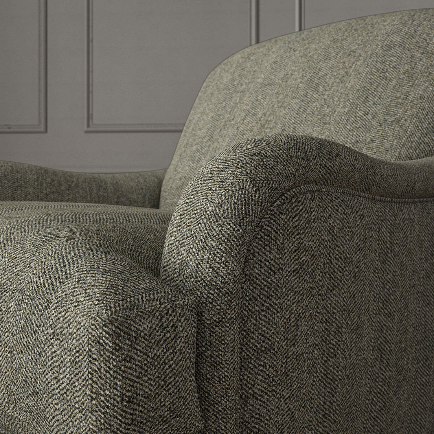 Grey chair upholstered in a herringbone pure wool woven fabric.