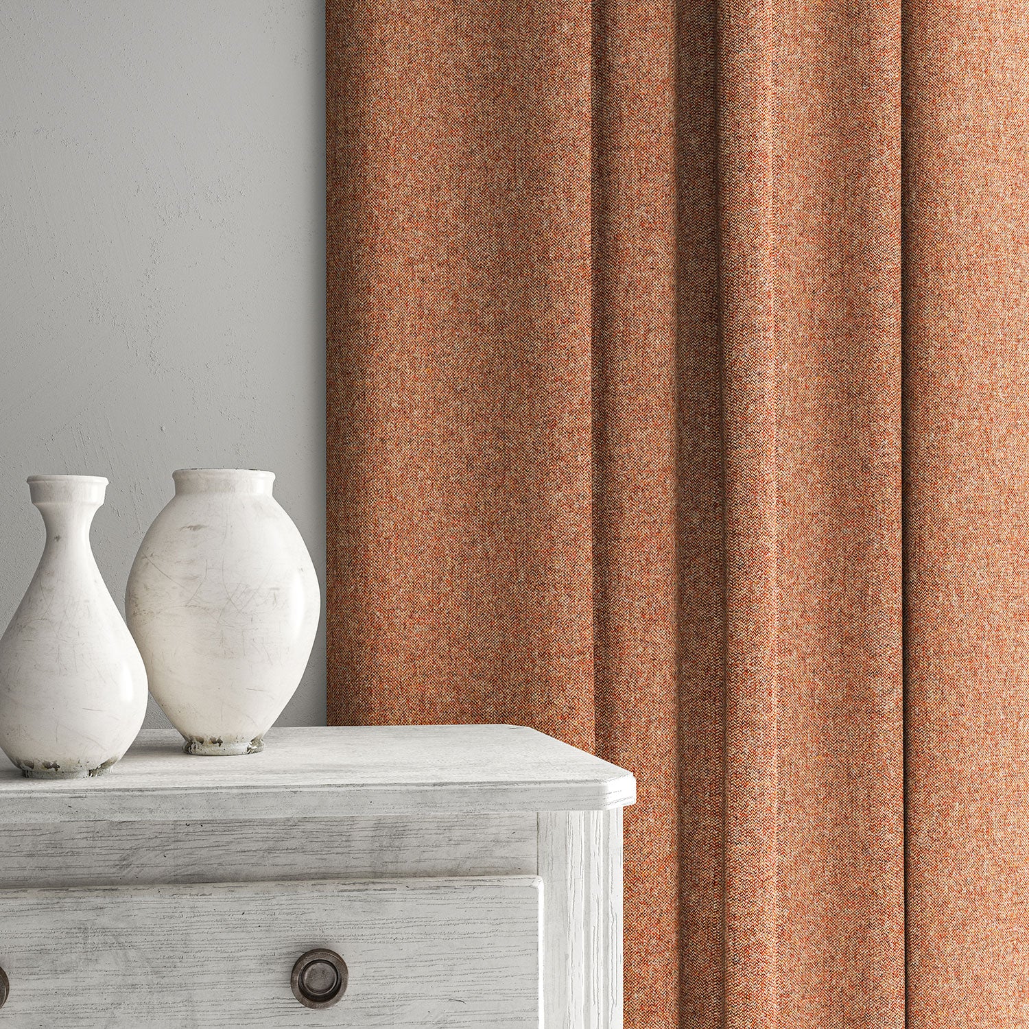 Orange curtain made from a plain pure wool woven fabric.