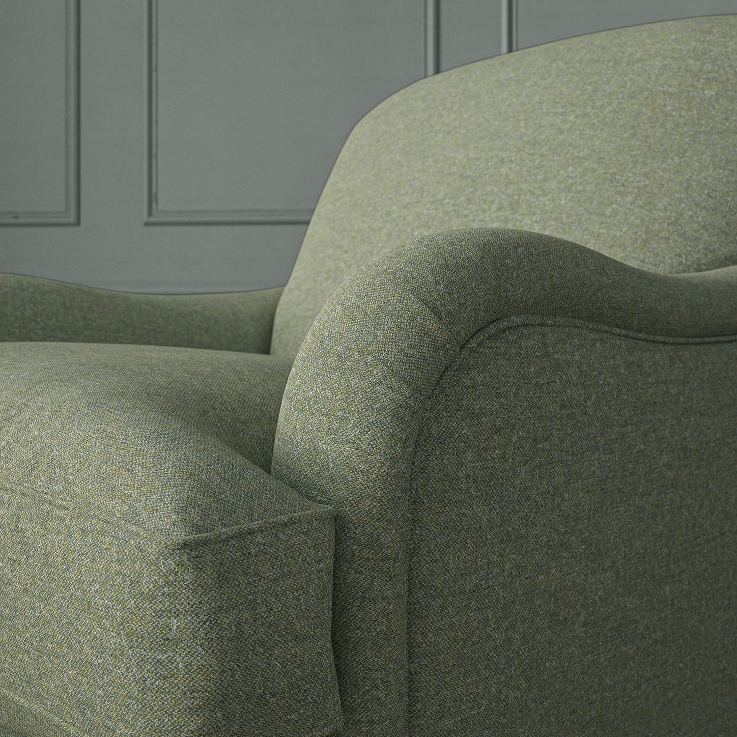 Green chair upholstered in a plain pure wool woven fabric.