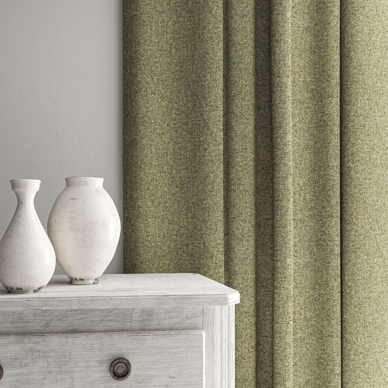 Green curtain made from a plain pure wool woven fabric.