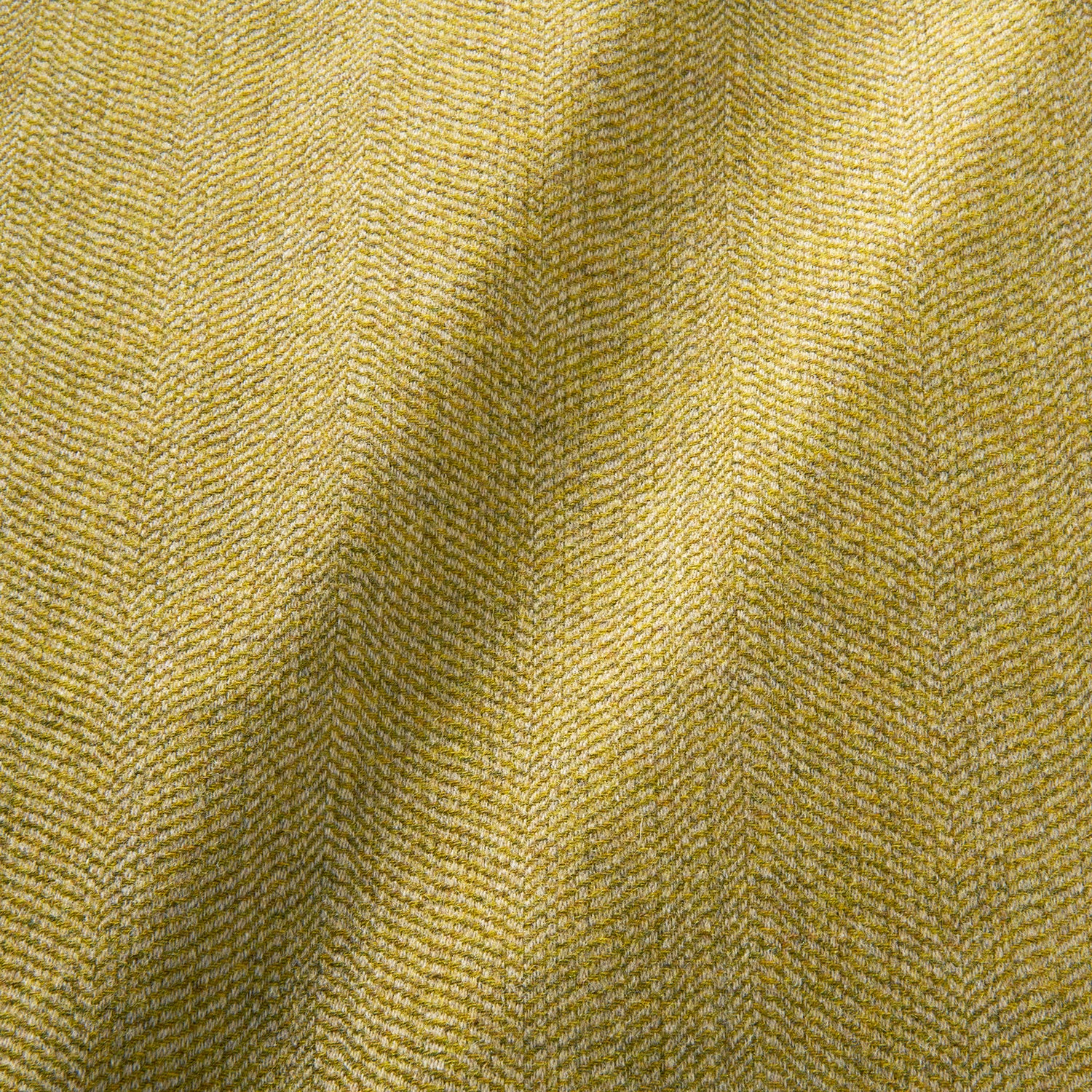 Sample of a classic herringbone woven fabric in yellow.