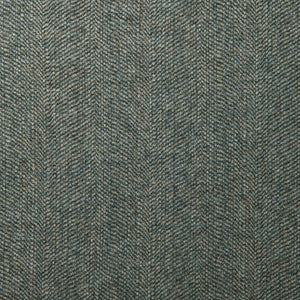 Sample of a classic herringbone woven fabric in blue.