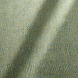 Sample of a classic herringbone woven fabric in green.