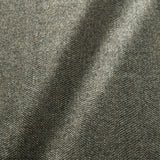 Sample of a classic herringbone woven fabric in grey.