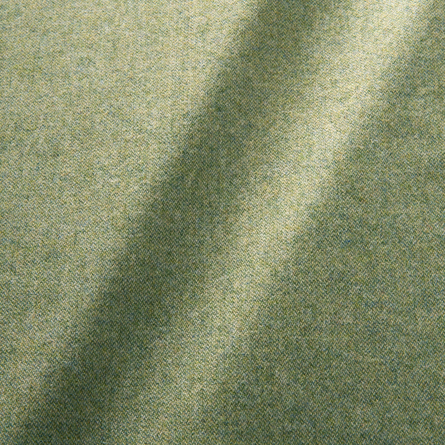 Sample of a pure wool woven fabric in green.