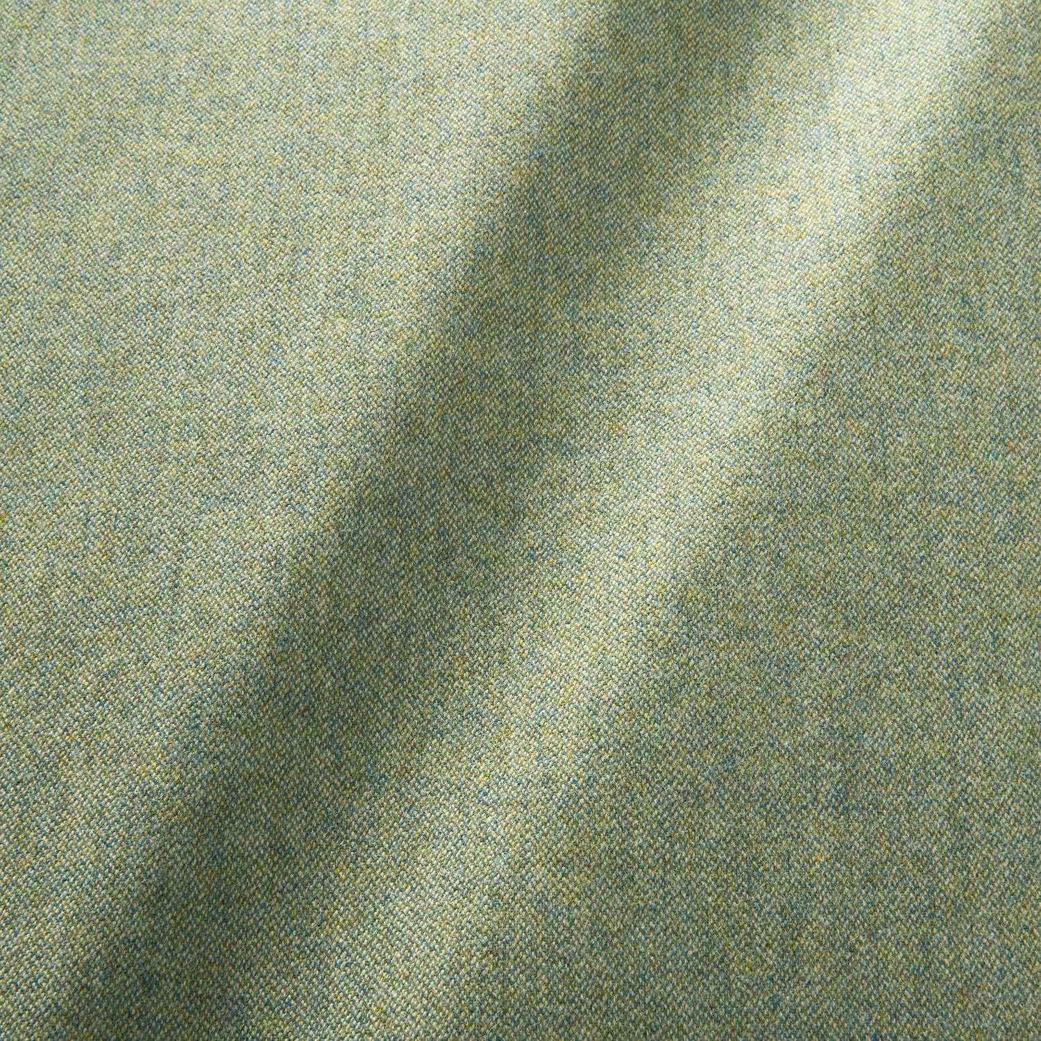 Sample of a pure wool woven fabric in green.