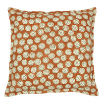 A orange, cream and black linen cushion with a all-over repeat pattern.