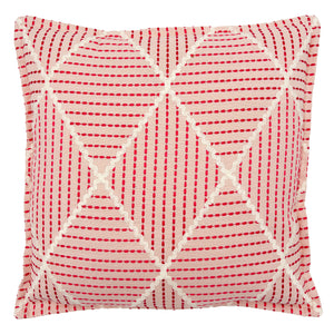Pink cushion with geometric red pattern.