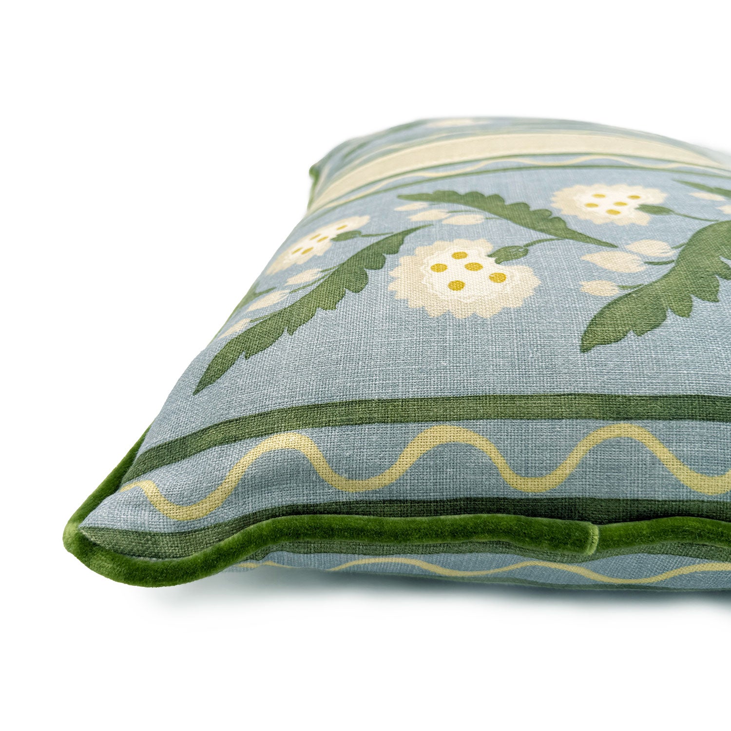 Close-up side view of Linwood cushion in Polly Stripe, Lakeside  showing fabric texture and piping in a luxurious green velvet.