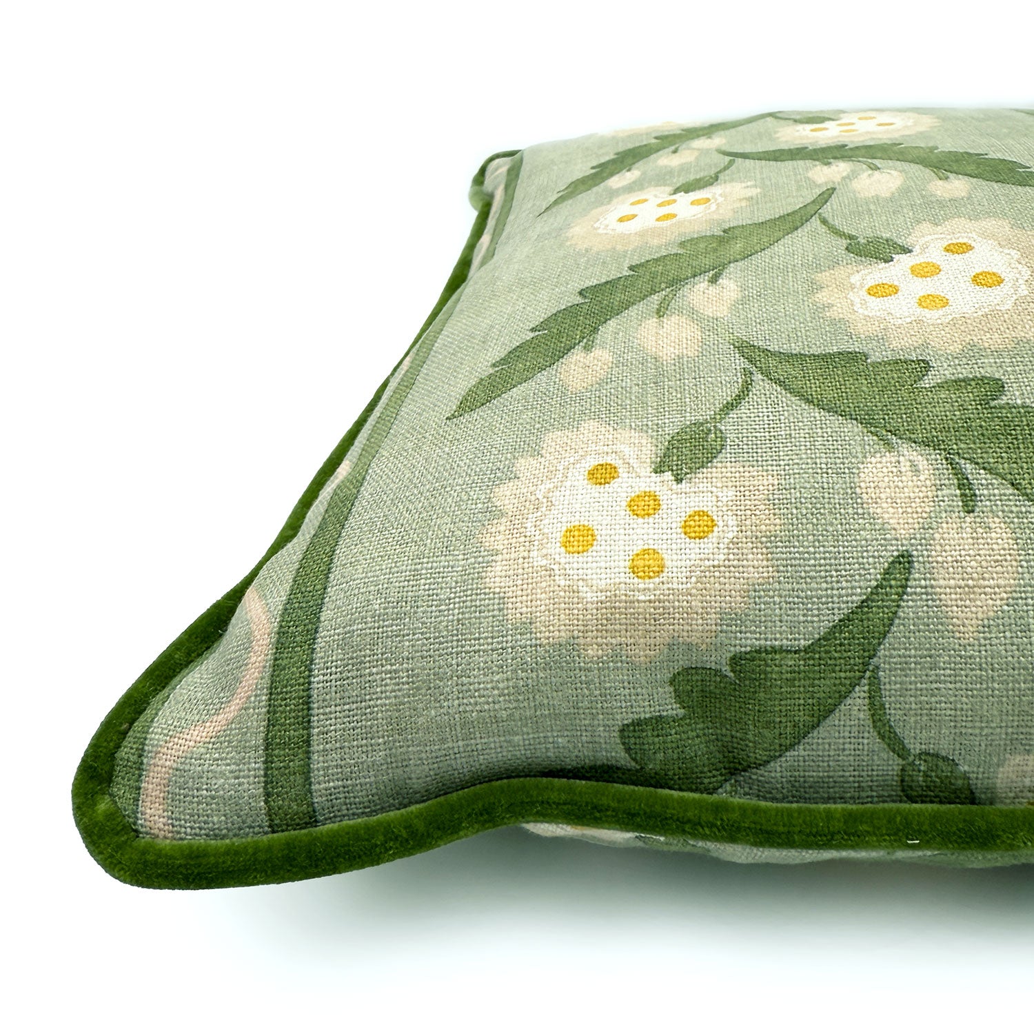 Close-up side view of Linwood cushion in Polly, Stripe Moss showing fabric texture and piping in a luxurious green velvet.