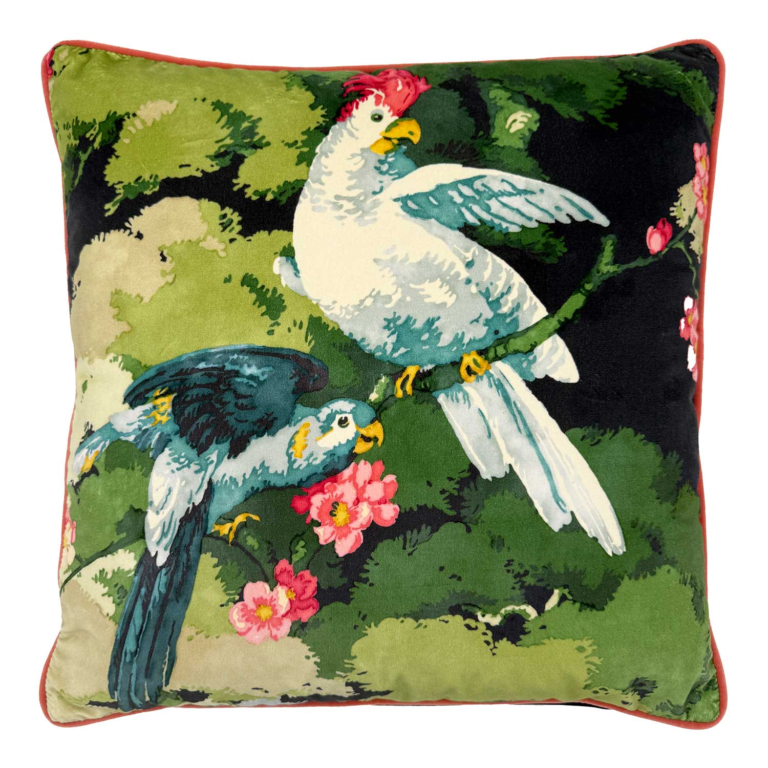 Linwood cushion in Jungle Jive Navy. Overhead view showing the full front design, featuring vibrant parrots set against lush greenery in a moody navy palette.