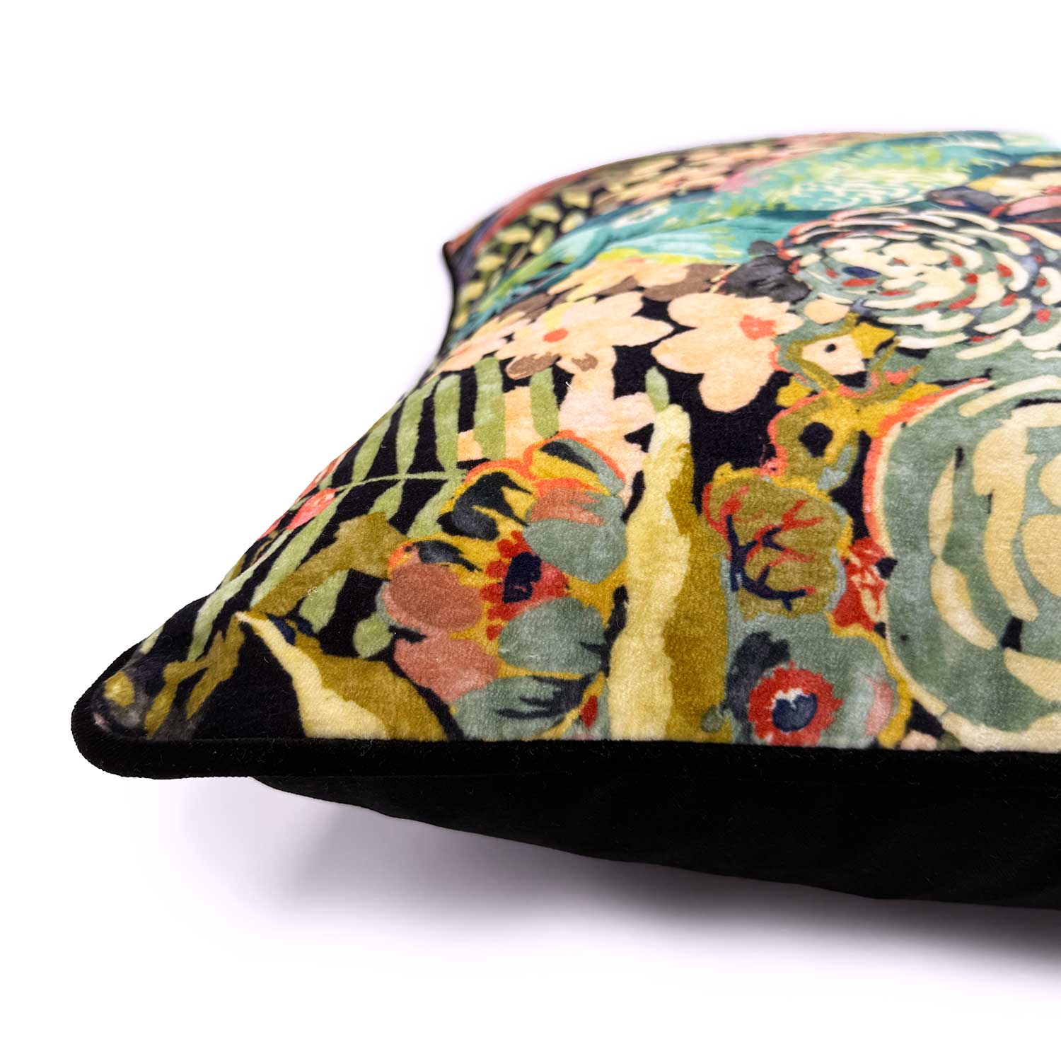 Close-up side view of Linwood cushion in Rainforest Rabble Neon, showing the fabric texture and contrast piping detail.