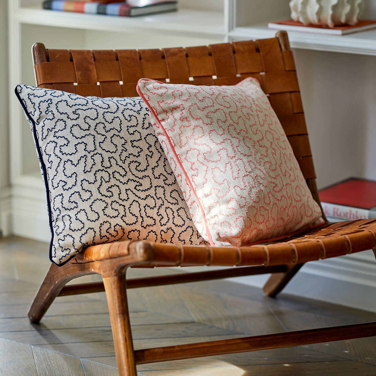 Woven cushions featuring a wavy pattern with a velvet piping.