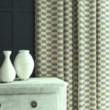 Curtains in Strata fabric showing gentle horizontal texture and soft drape.
