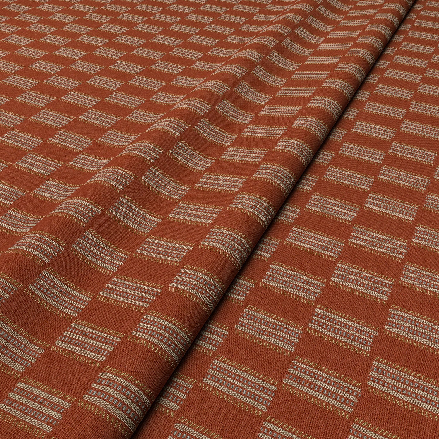 Strata fabric styled in a wave to show horizontal structure and depth.