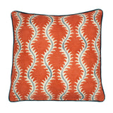 A orange, cream and blue linen cushion with a all-over repeat pattern and velvet piping.
