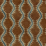 A printed velvet fabric sample in brown and blue featuring a stylized fern pattern.