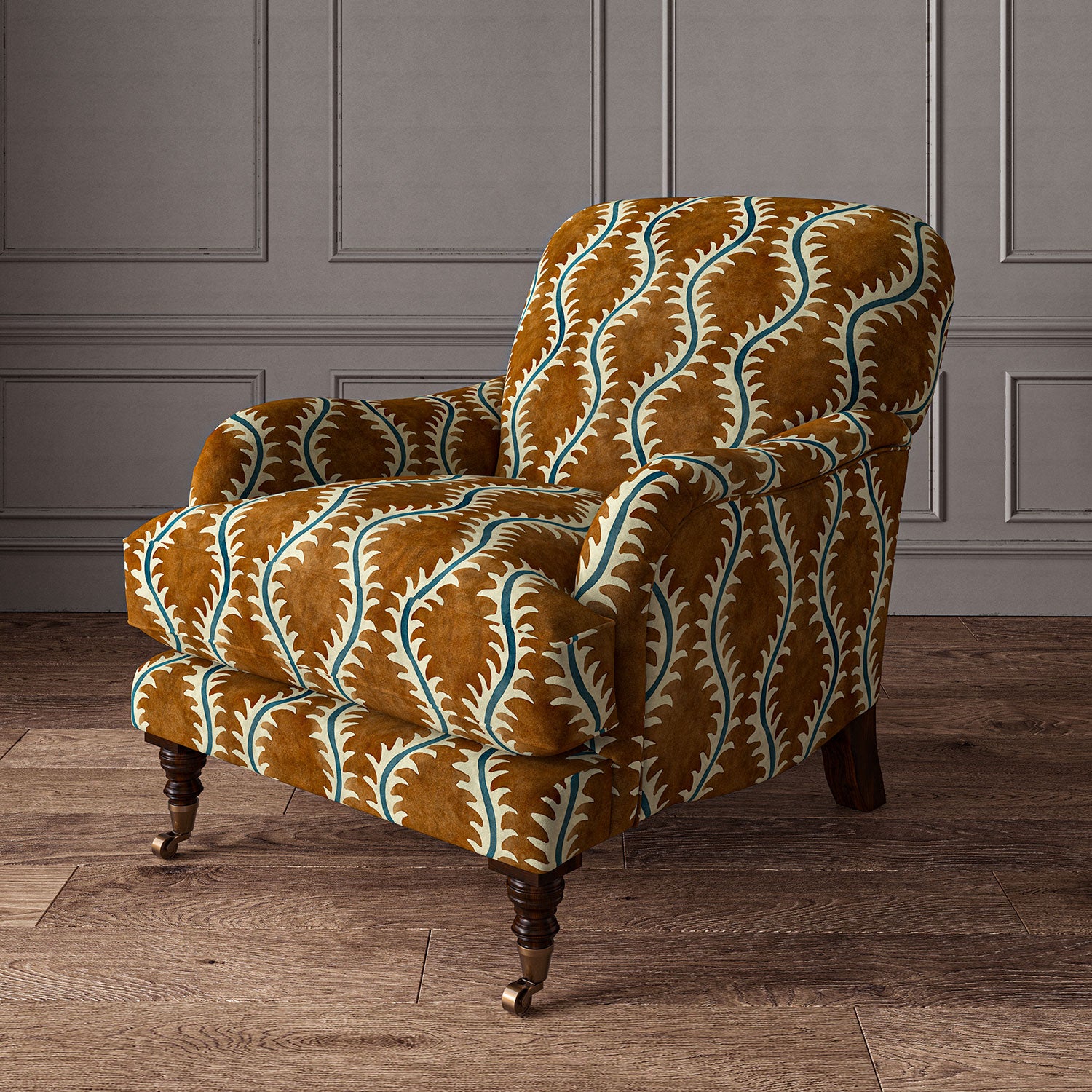 Armchair upholstered in a printed velvet fabric in brown and blue featuring a stylized fern pattern.