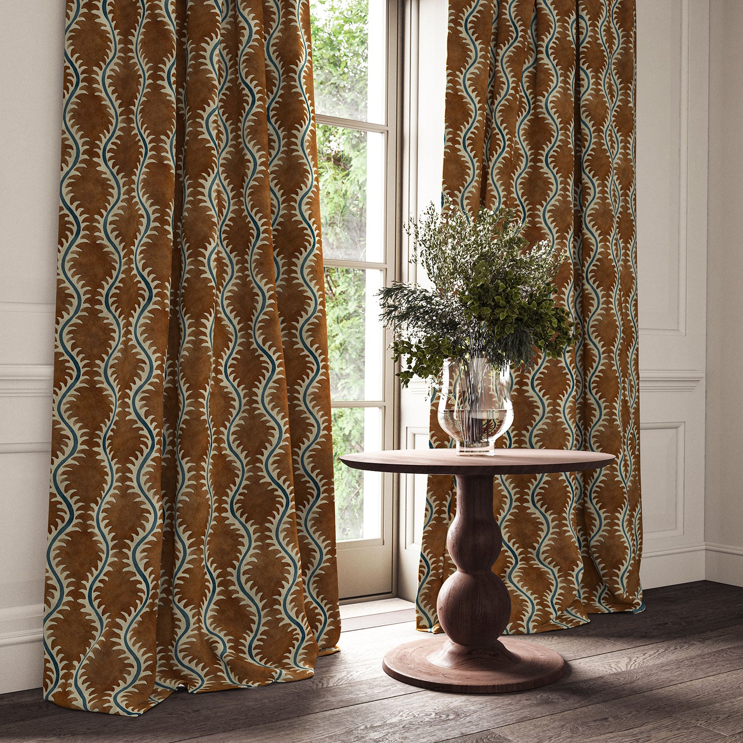 Curtains in a printed velvet fabric in brown and blue featuring a stylized fern pattern.