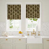 Blinds in a printed velvet fabric in brown and grey featuring a stylized fern pattern.