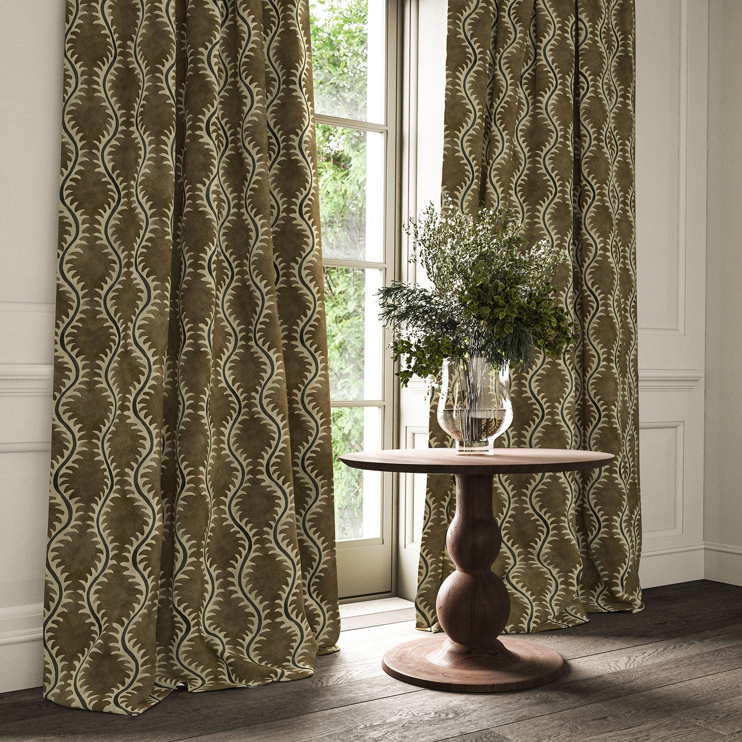 Curtains in a printed velvet fabric in brown and grey featuring a stylized fern pattern.