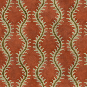 A printed velvet fabric sample in brown and orange featuring a stylized fern pattern.