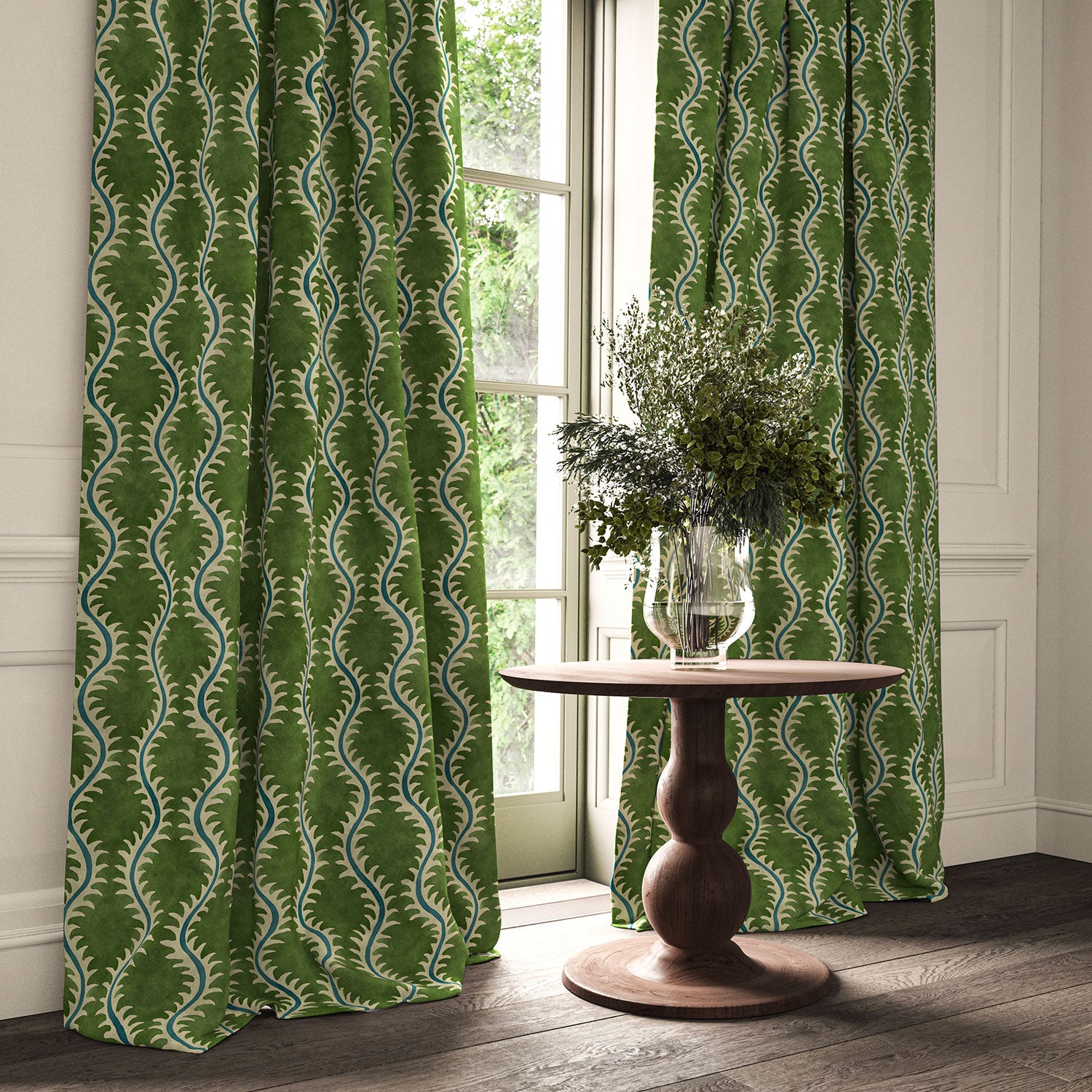 Curtains in a printed velvet fabric in green and blue featuring a stylized fern pattern.