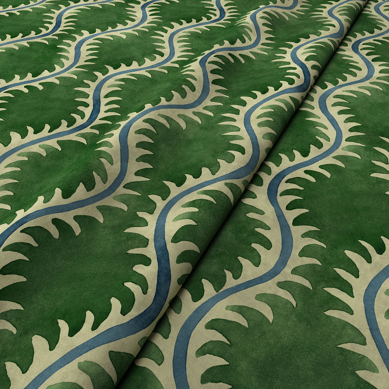 A printed velvet fabric sample in green and blue featuring a stylized fern pattern.