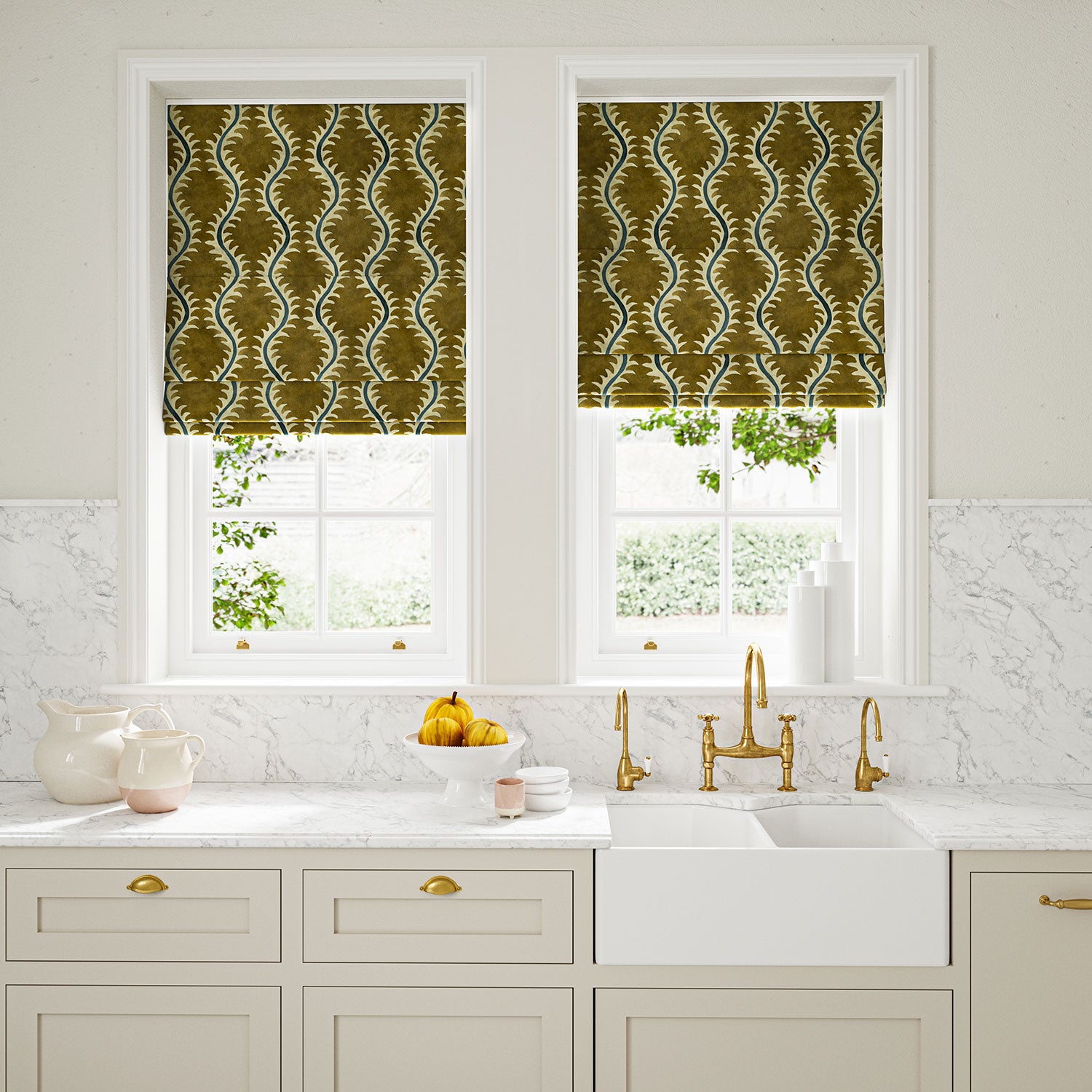 Blinds in a printed velvet fabric in brown and blue featuring a stylized fern pattern.