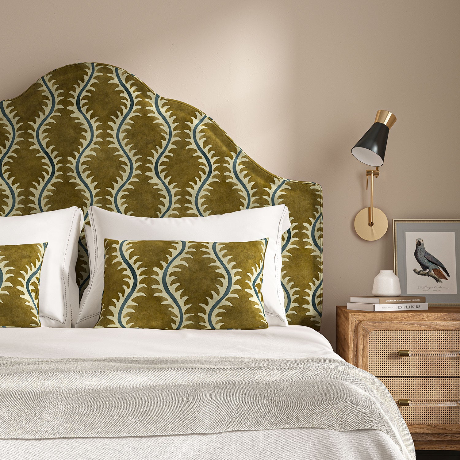 Headboard upholstered in a printed velvet fabric in brown and blue featuring a stylized fern pattern.