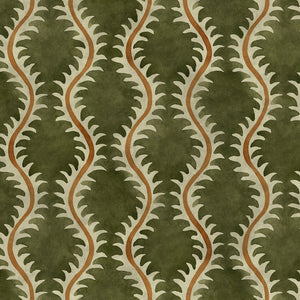 A printed velvet fabric sample in green and orange featuring a stylized fern pattern.