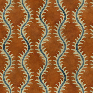 A printed velvet fabric sample in orange and blue featuring a stylized fern pattern.