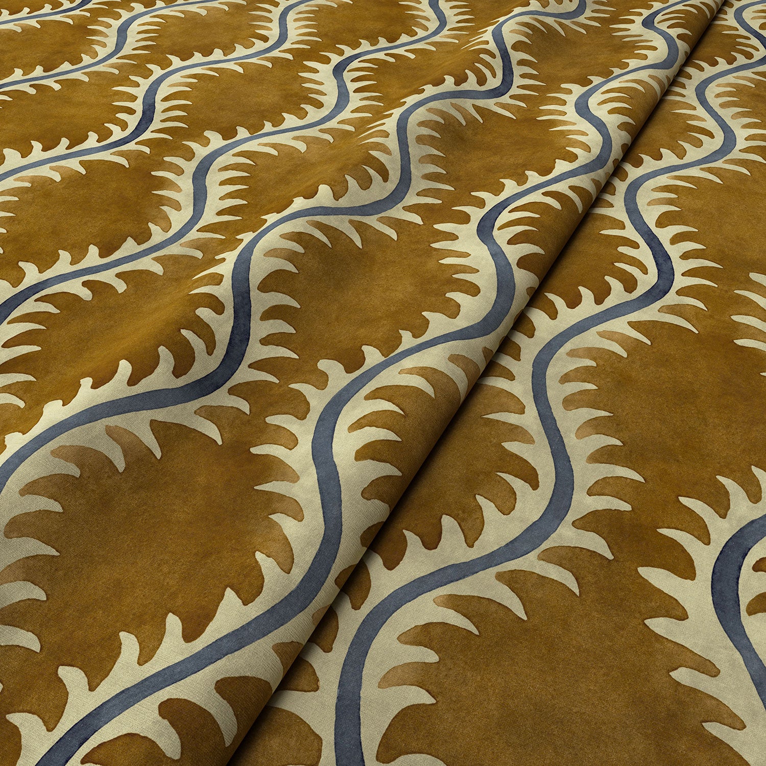 A printed velvet fabric sample in brown and blue featuring a stylized fern pattern.