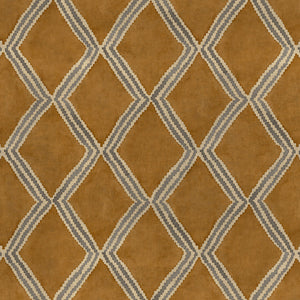 Close-up of brown and blue printed velvet fabric featuring an irregular diamond motif with a soft, luxurious pile. 