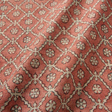 Linen fabric with a hand block-style pattern in red, black and cream
