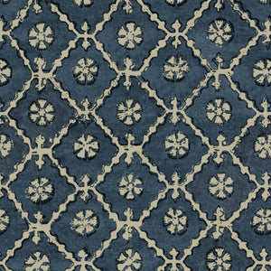 Linen fabric with a hand block-style pattern in blue, black and cream