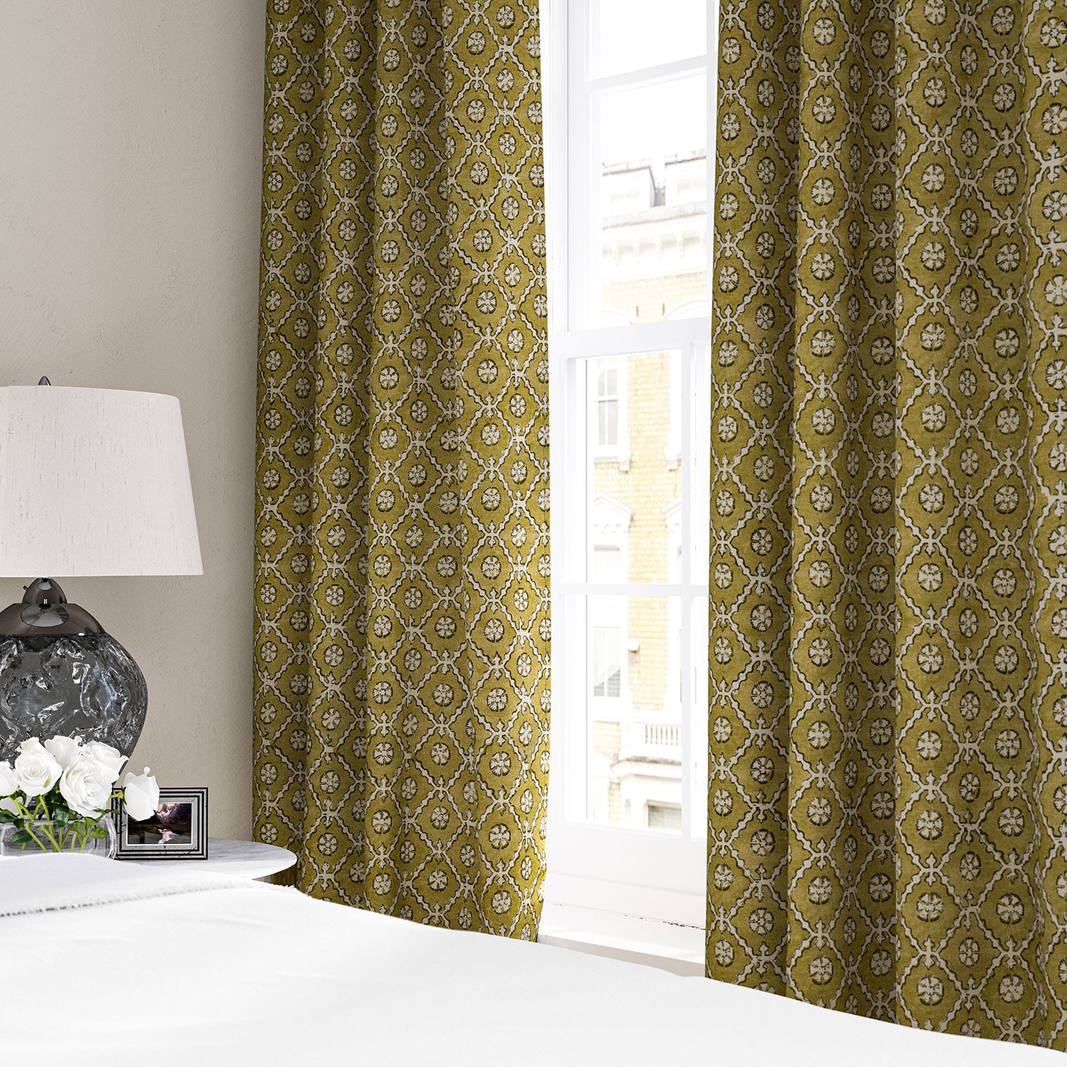Linen curtain with a hand block-style pattern in yellow, black and cream