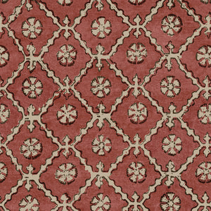 Linen fabric with a hand block-style pattern in red, black and cream