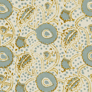 A stylised floral printed on linen fabric in green, orange and cream