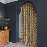 Stylised floral linen curtain in orange, black and cream