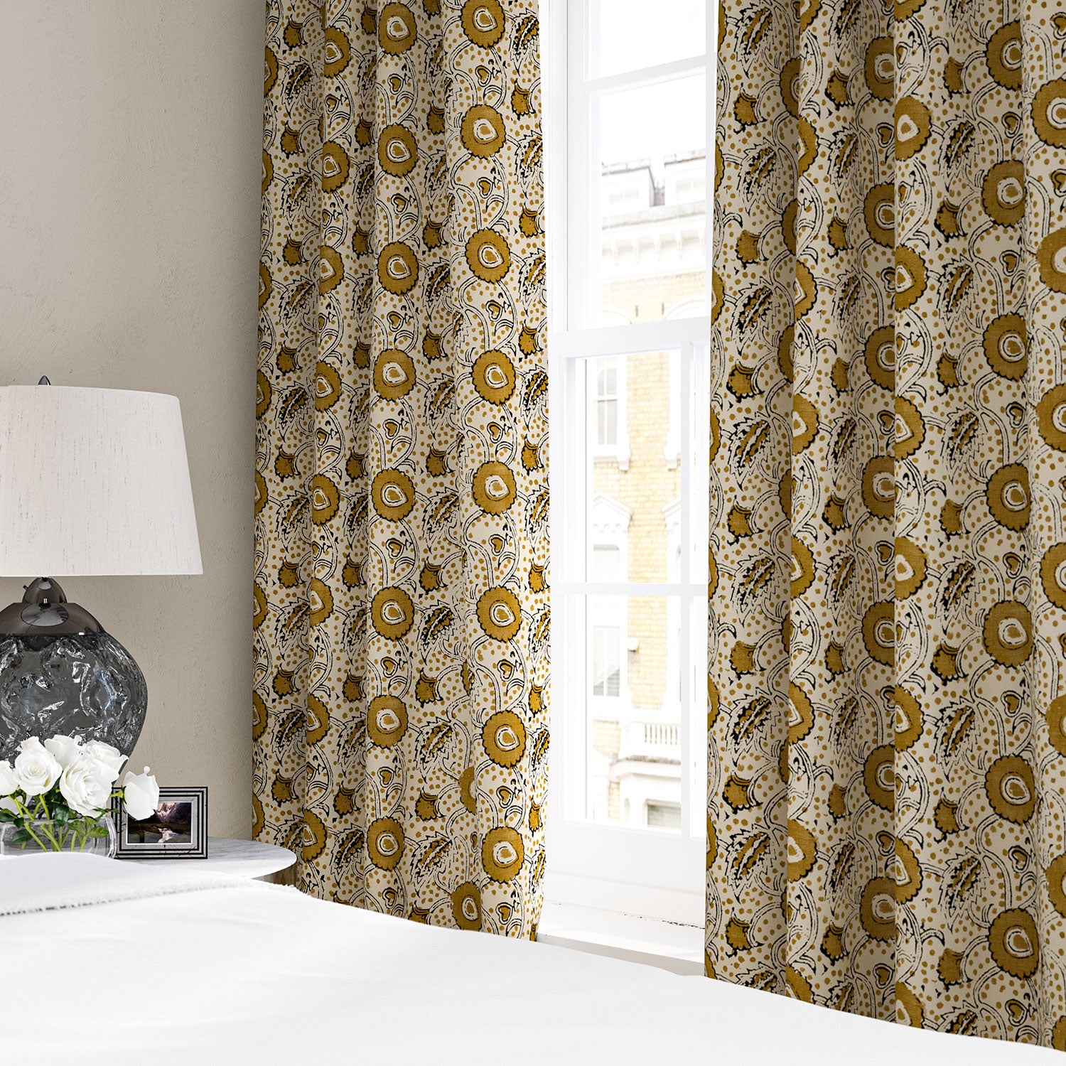 Stylised floral linen curtain in orange, black and cream