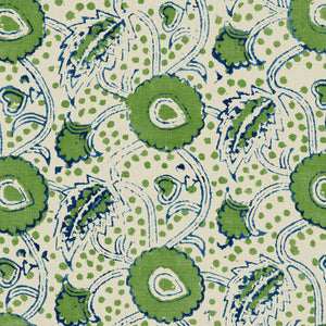 A stylised floral printed on linen fabric in green, blue and cream