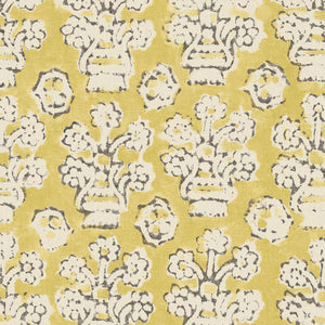 A jolly printed linen fabric in yellow, black and cream